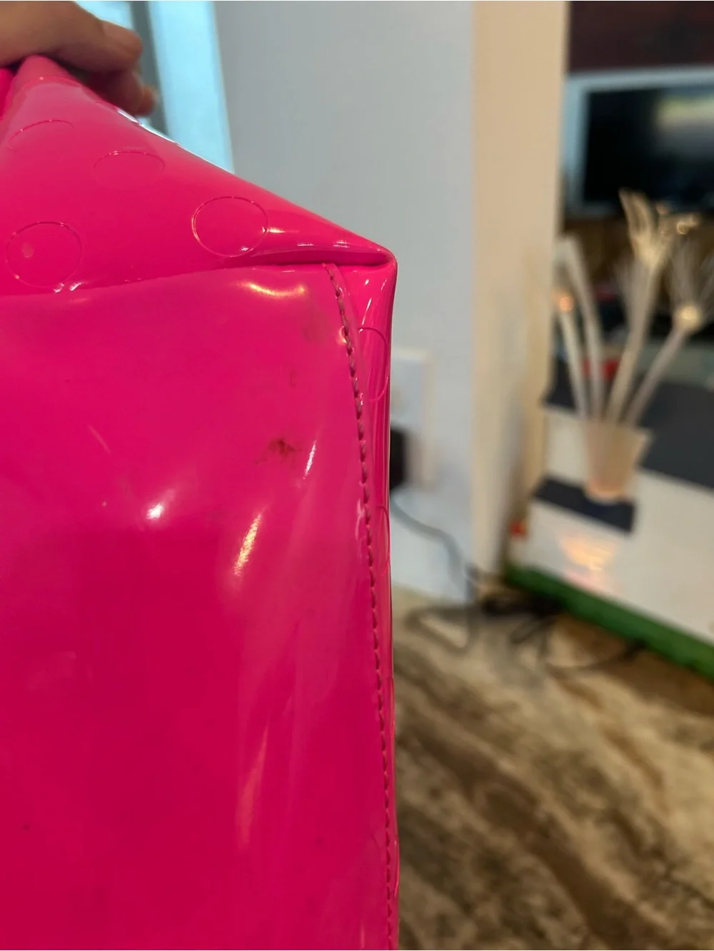 kate spade camellia st Sophie Tote in Hot Pink has a few marks scuffs peeling